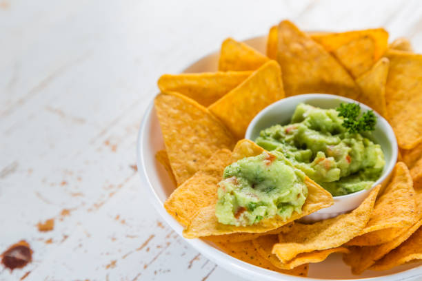 istock Guacamole sauce and nachos 909197462