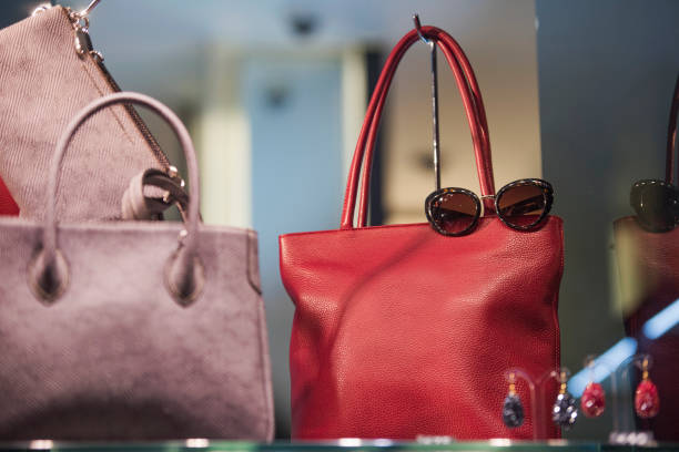 istock Fancy store apparel - handbags and sunglasses in a store in Milan 909200064
