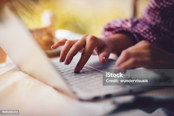 Closeup Of Womans Hands Typing On Laptop Keyboard Stock Photo - Download Image Now