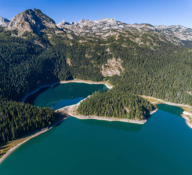 istock Aerial view on Black lake in National park Durmitor. 909206896