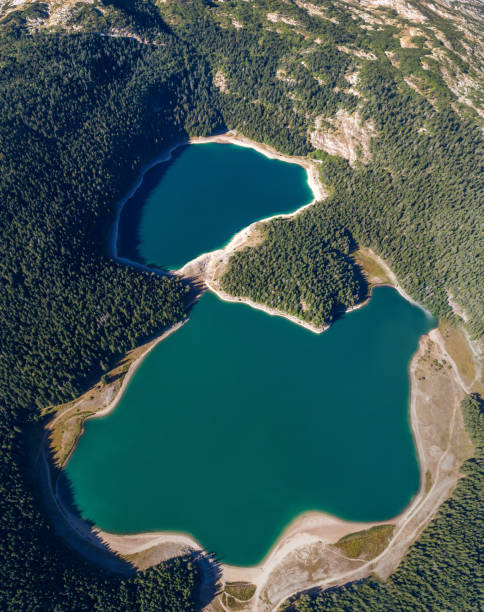 istock Aerial view on Black lake in National park Durmitor. 909207352
