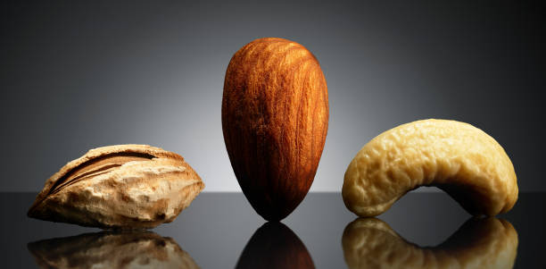 istock Group of nuts on black background. Close-up 909208064