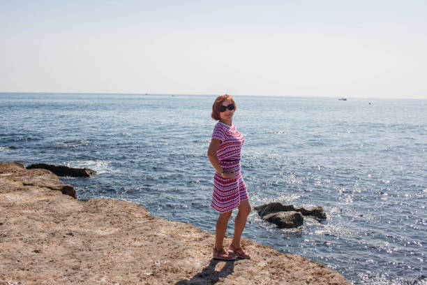 istock Woman and sea 909216446