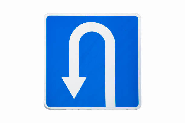 'U-Turn' traffic road sign isolated on white.
