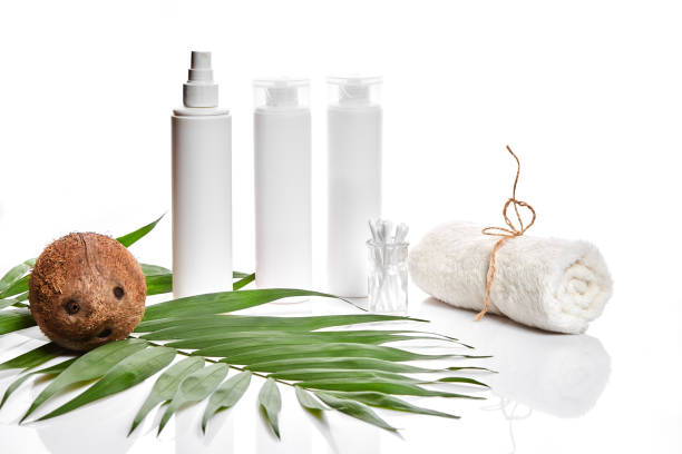 istock Organic cosmetics with coconut on white background 909224712