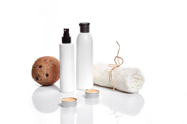 istock Organic cosmetics with coconut on white background 909225194