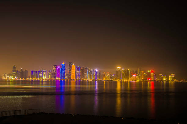 istock Doha, QATAR -DECEMBER 25, 2016: Night Doha skyline view 909225376