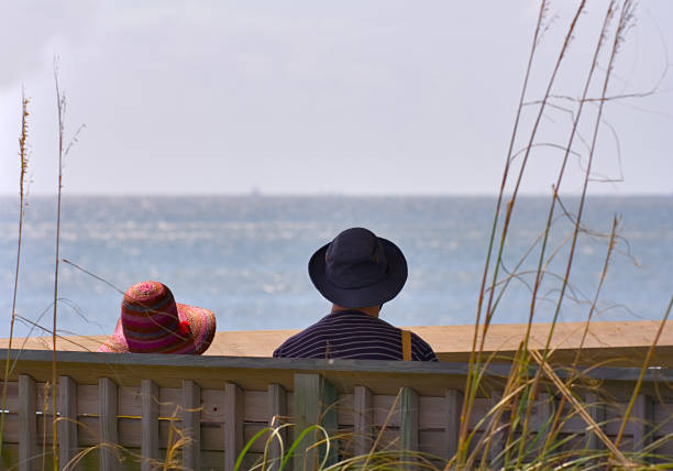 istock Old couple by the sea 90922681