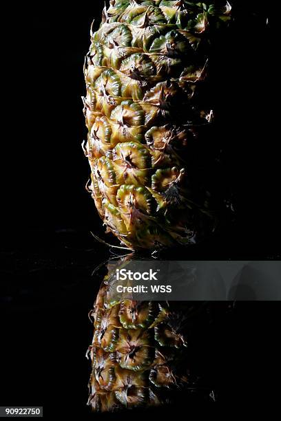 Pineapple Stock Photo - Download Image Now - Black Background, Black Color, Brown