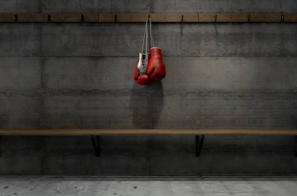 istock Boxing Gloves Hanging In Change Room 909231288
