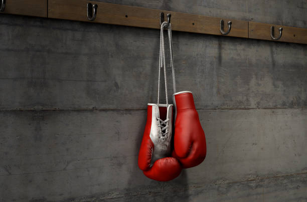 istock Boxing Gloves Hanging In Change Room 909231396