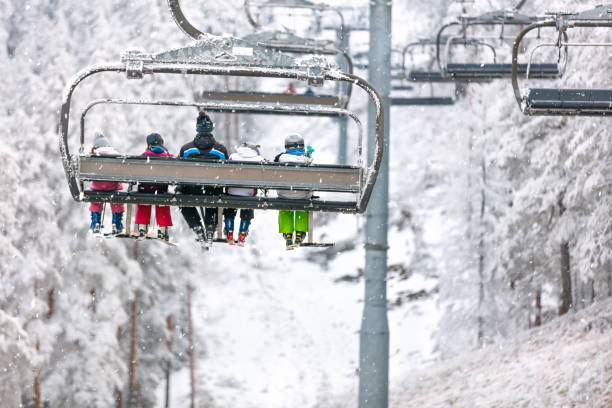 istock Skiers on ski lift 909231704