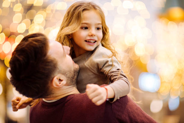 istock Little girl hugging dad 909231812