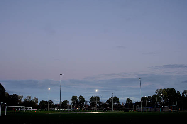 istock Training football at dusk 90924224
