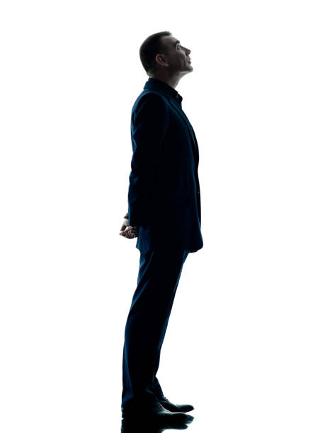 istock business man standing silhouette isolated 909245388