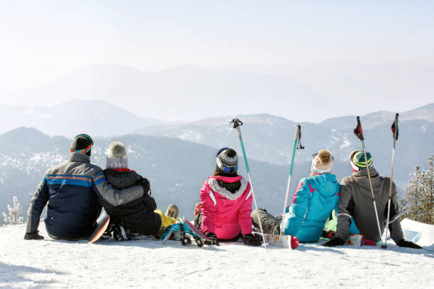 istock Friends enjoying in snowy nature 909245620