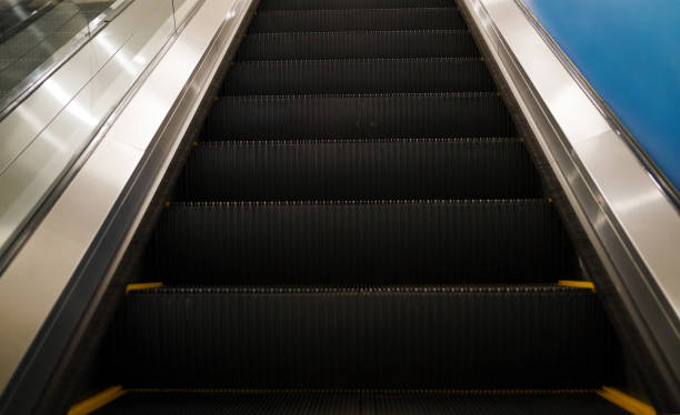 istock Escalator in department store 909246308