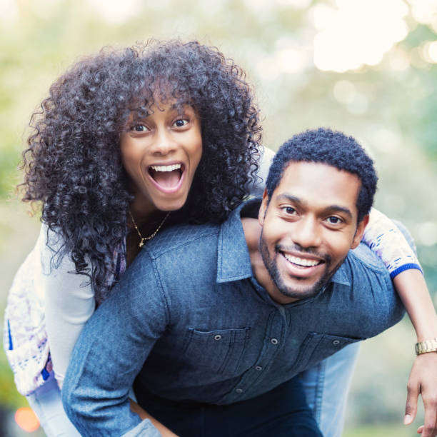 istock Happy young couple outdoors 909258478