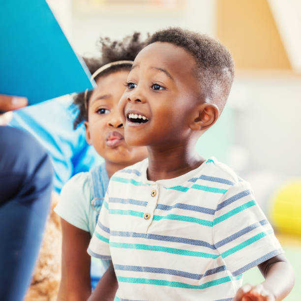 Excited preschooler during story time