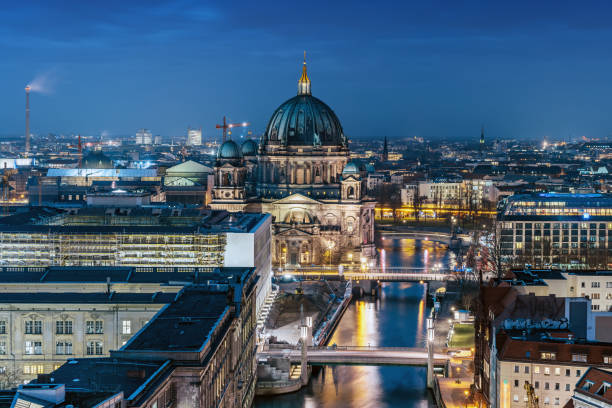 The Dresden Catholic Hofkirche at night illuminated, baroque architecture visible. Photo from a public space. Artwork in the public domain. Copyspace