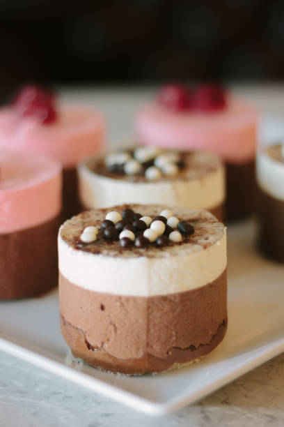 istock Creamy cakes with coffie at restaurant. 909276008