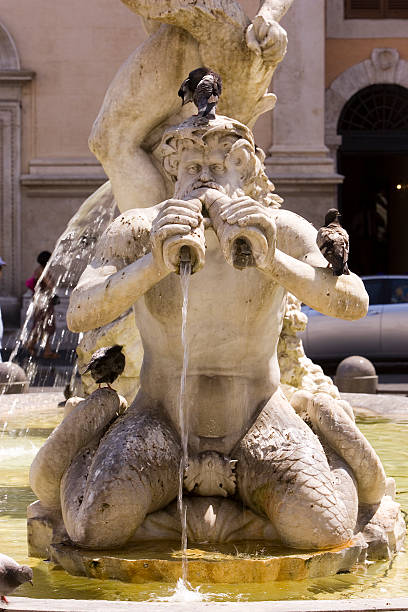 istock statues in rome, piazza navona 90927735