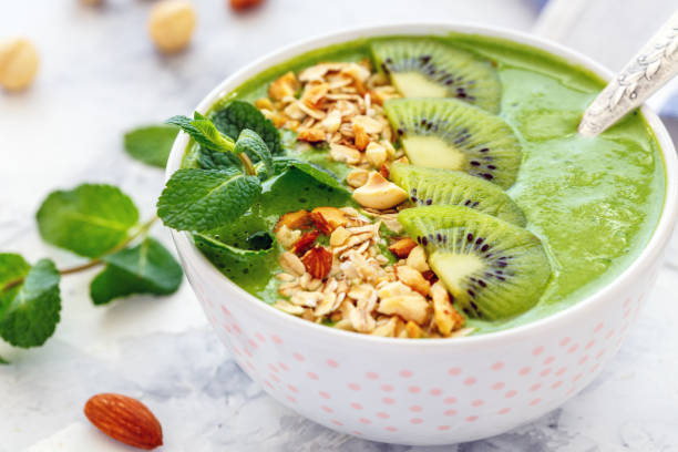 istock Green smoothie bowl for a healthy breakfast. 909278832