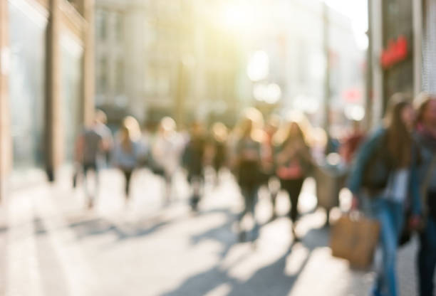 istock blurred people in a shopping street 909283248