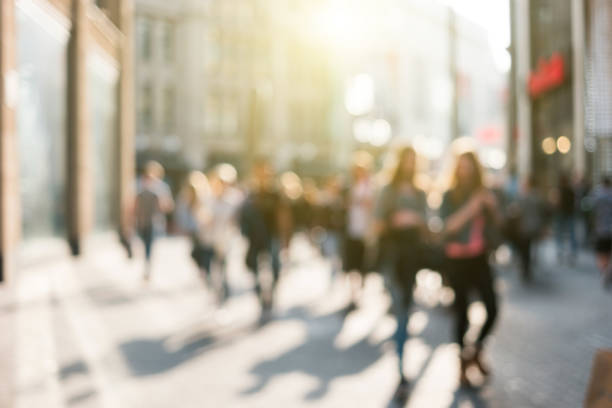 istock blurred people in a shopping street 909283252