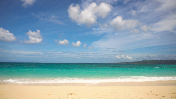 istock Beautiful beach on tropical island 909283708