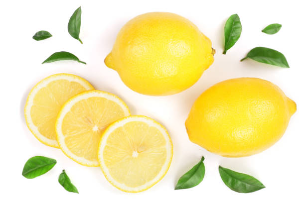 istock lemon and slices with leaf isolated on white background. Flat lay, top view 909294702