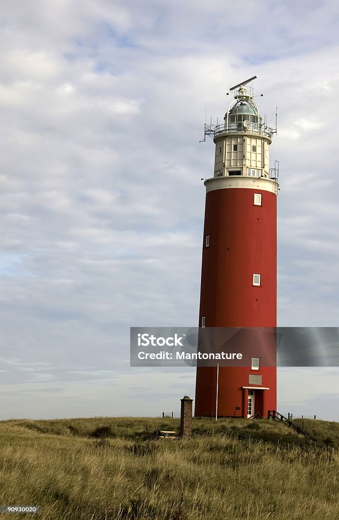 Farol Texel contra nublado céu - Foto de stock de Amarelo royalty-free