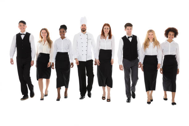 istock Restaurant Staff Walking Against White Background 909303526