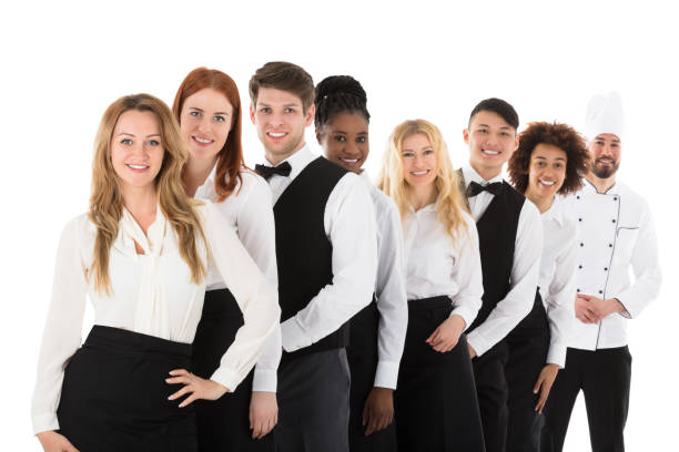 istock Confident Restaurant Staff Standing In Row 909303562