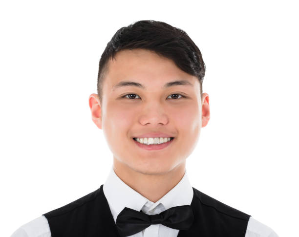 istock Portrait Of A Young Waiter 909303618