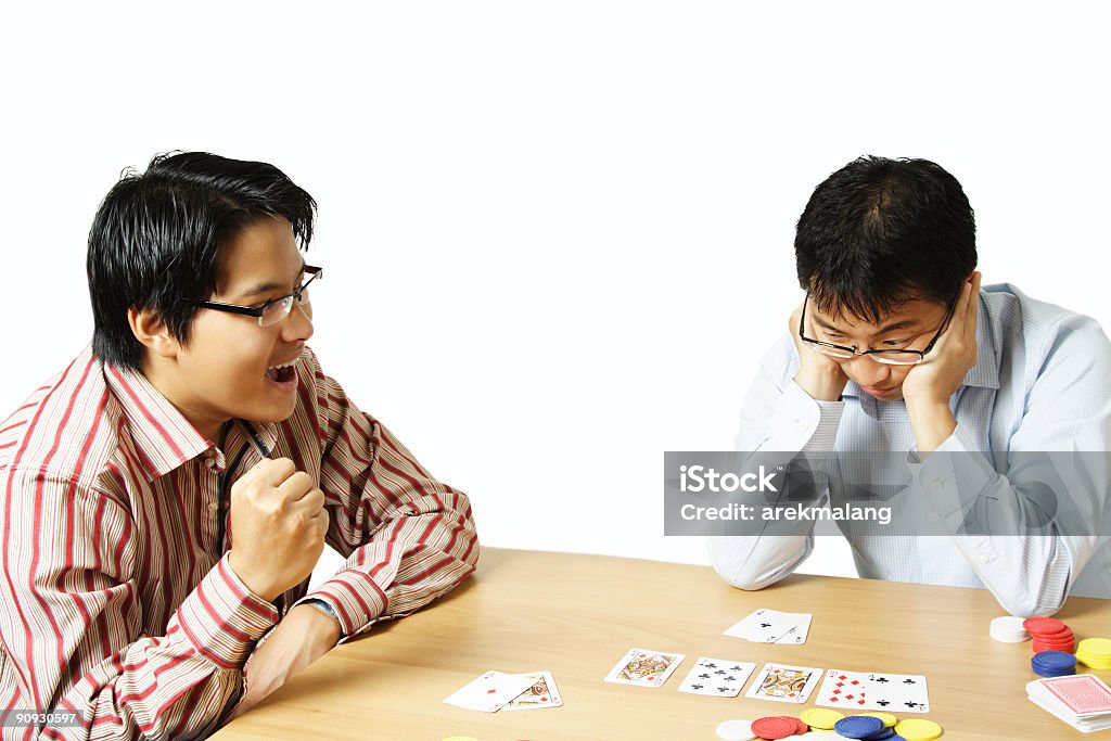 Playing poker  Adult Stock Photo