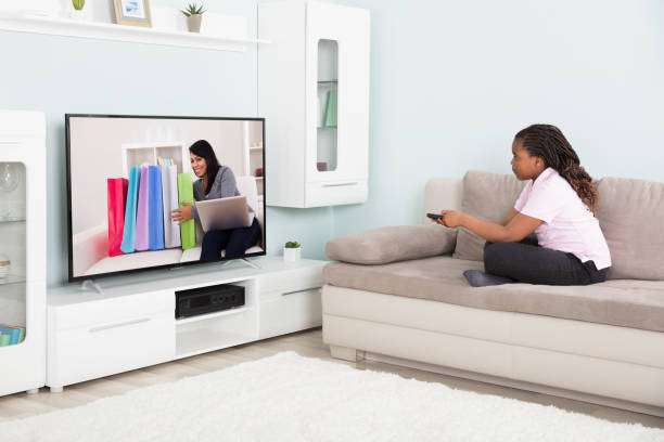 istock Girl Watching Television 909307150