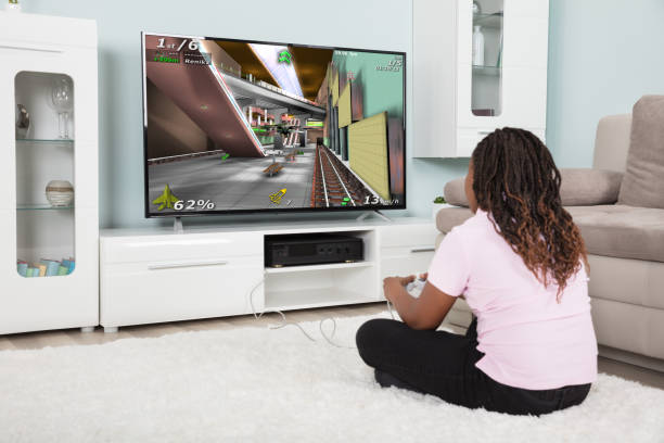 istock An African Girl Playing Video Games 909307200