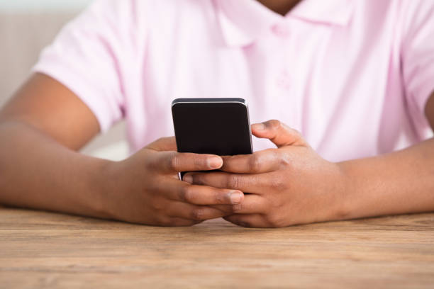 istock Close-up A Girl Using Smart Phone 909307236