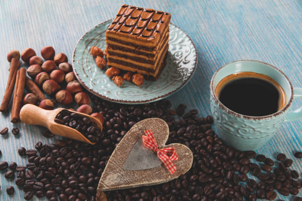 istock cake layers black coffee in a cup and beans 909307454