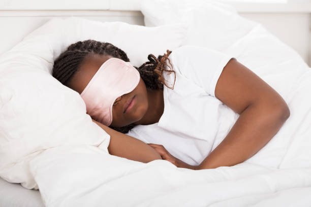 istock African Girl Sleeping In Bed 909310052