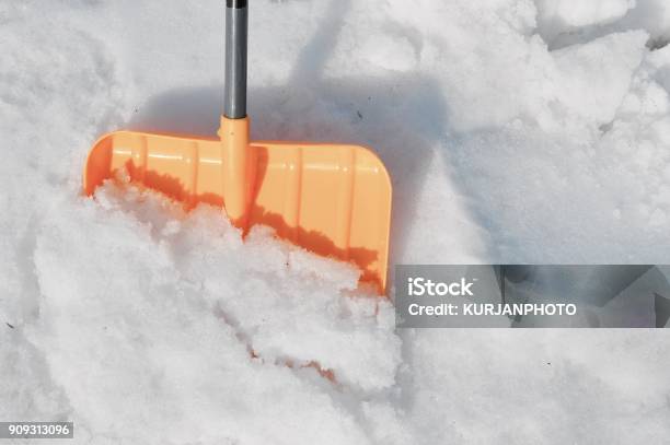 Yellow Snow Shovel In White Snow Stock Photo - Download Image Now - Beauty In Nature, Close-up, Cold Temperature
