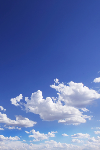 cloudy blue sky with white fluffy clouds. cloudscape background.