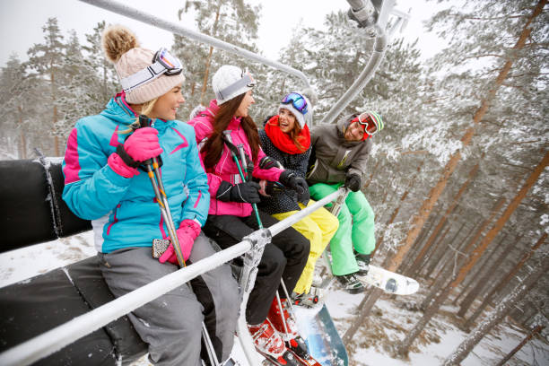 istock Cheerful people going to ski terrain 909314510