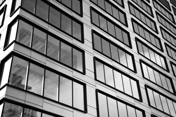 istock Modern office building. Architectural details of modern  building. Black and white. 909325344