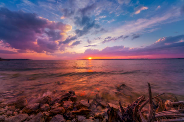 istock Colorful Sunset Over the Lake 909328524