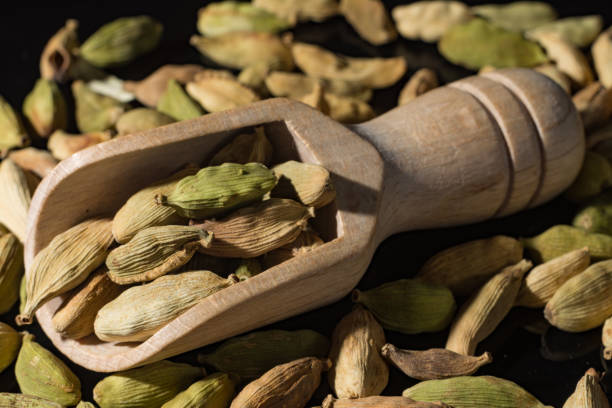 istock Macro collection, dried green cardamom pods close up 909328908