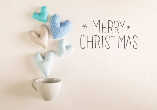 istock Merry Christmas message with blue heart cushions 909336354