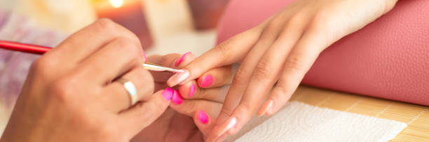 istock Manicure process in beauty salon 909340436