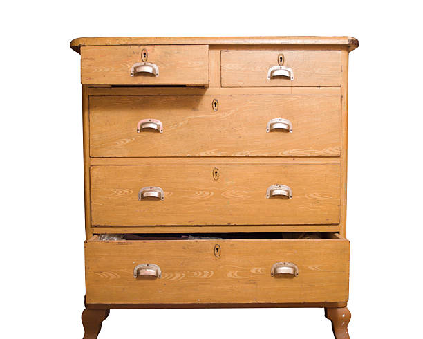 Retro wooden chest of drawers that is partially open stock photo